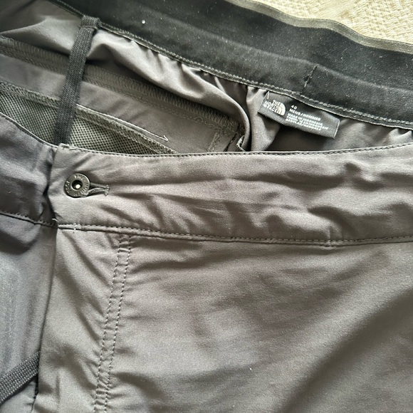 Dark gray convertible North Face hiking pants. - Picture 2 of 3